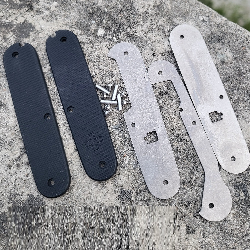 La navaja suiza Victorinox de 91 mm SAK parte las básculas con mango Mod G10