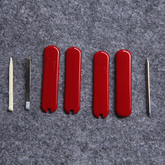 Navaja multiusos Mini Champ de 58 mm con mango de escama roja